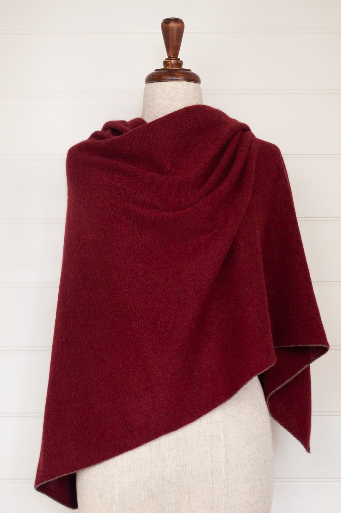 Juniper Hearth baby yak poncho in Cherry Red.