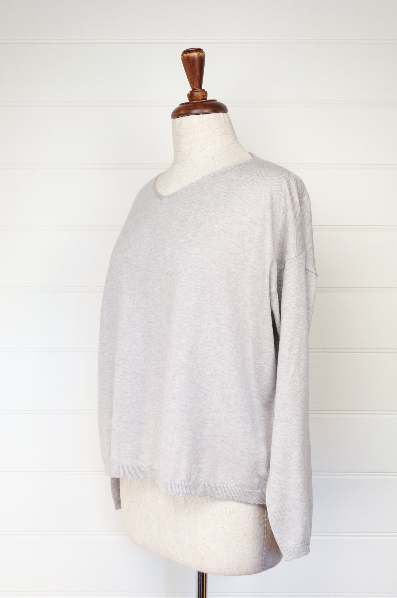 One size slouchy V-neck sweater in cashmere cotton, light ash grey. Ethically made in Nepal.