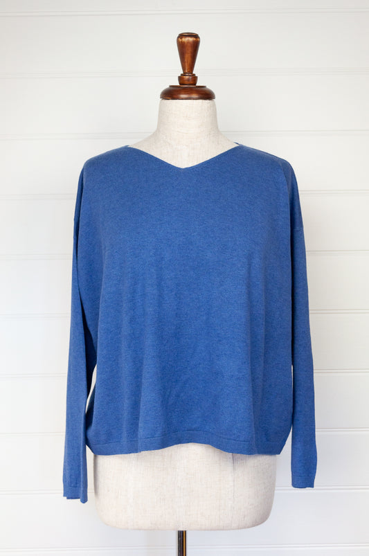 One size slouchy V-neck sweater in cashmere cotton, marine blue. Ethically made in Nepal.