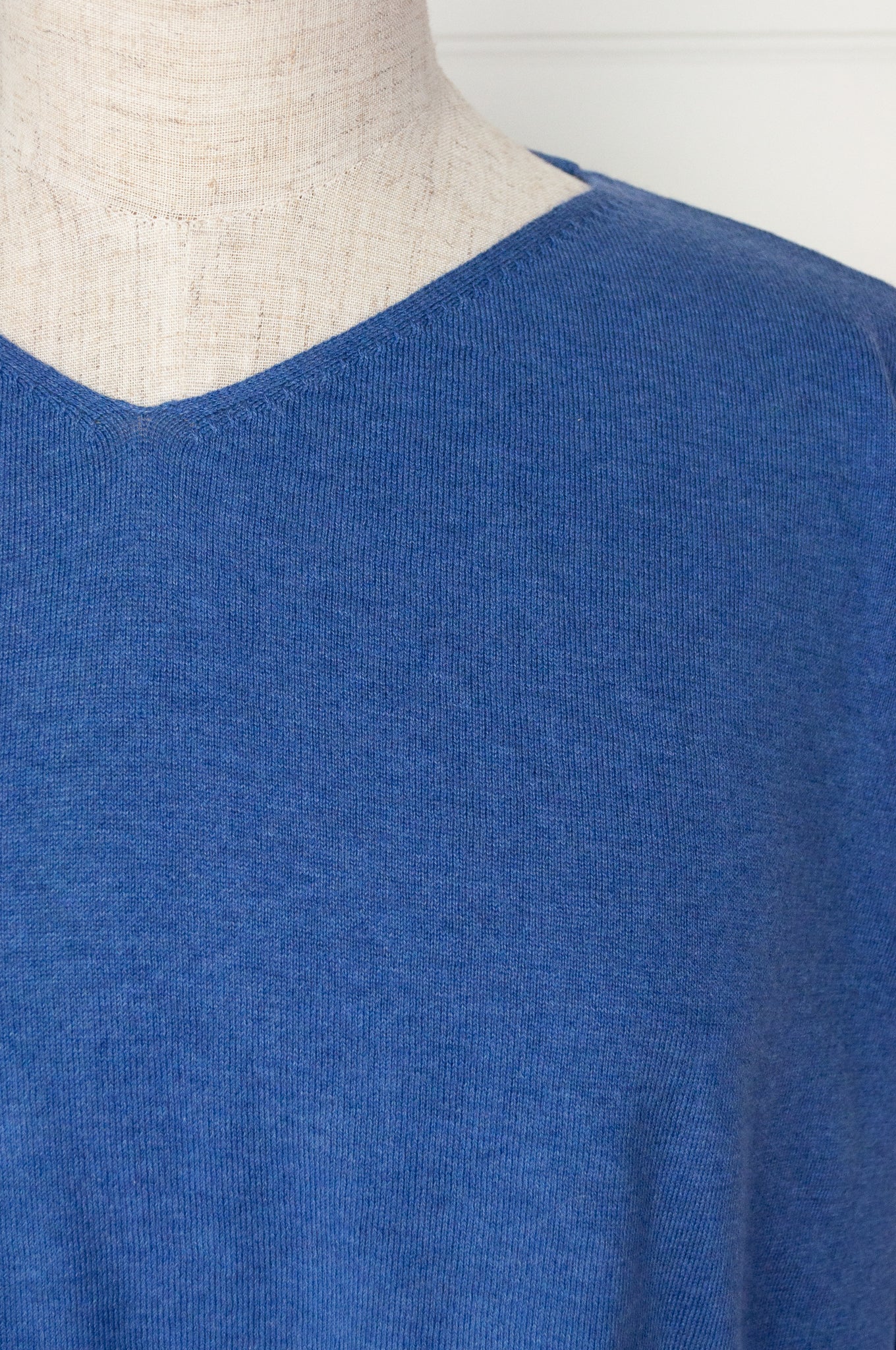 One size slouchy V-neck sweater in cashmere cotton, marine blue. Ethically made in Nepal.