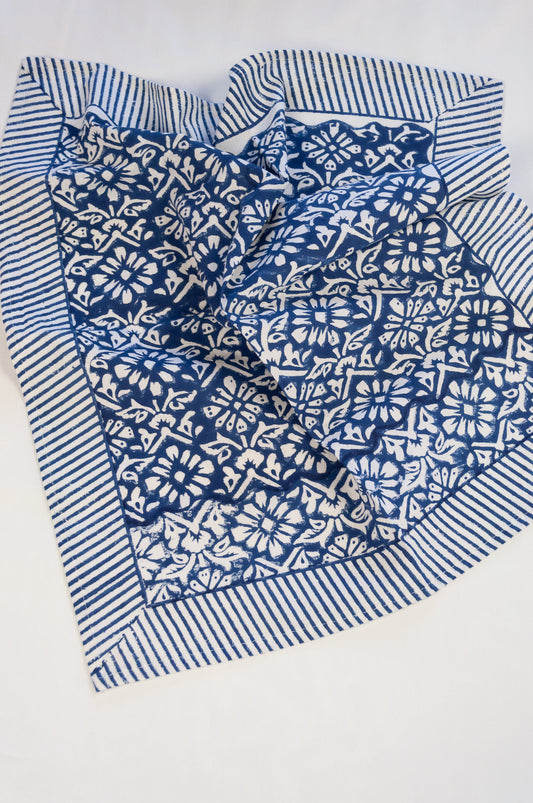 Block print cotton table napkins, Nila indigo blue and white floral print with striped border.