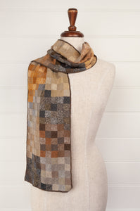 Sophie Digard pure wool artisan crocheted scarf, designed in France made in Madagascar, Puk in Tortuga earth palette of mustard, taupe, chocolate and charcoal.