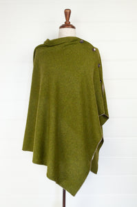 Made in Nepal one size button up poncho in chartreuse green.