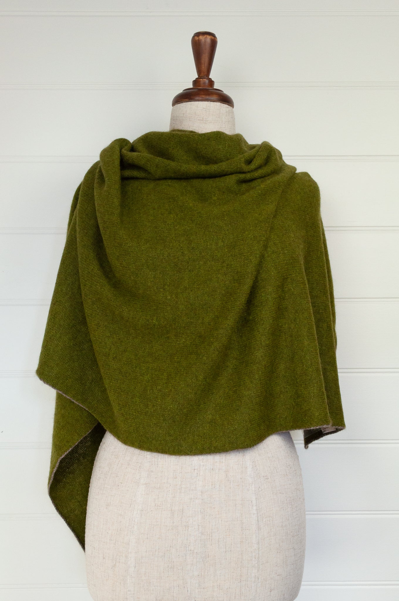 Made in Nepal one size button up poncho in chartreuse green.