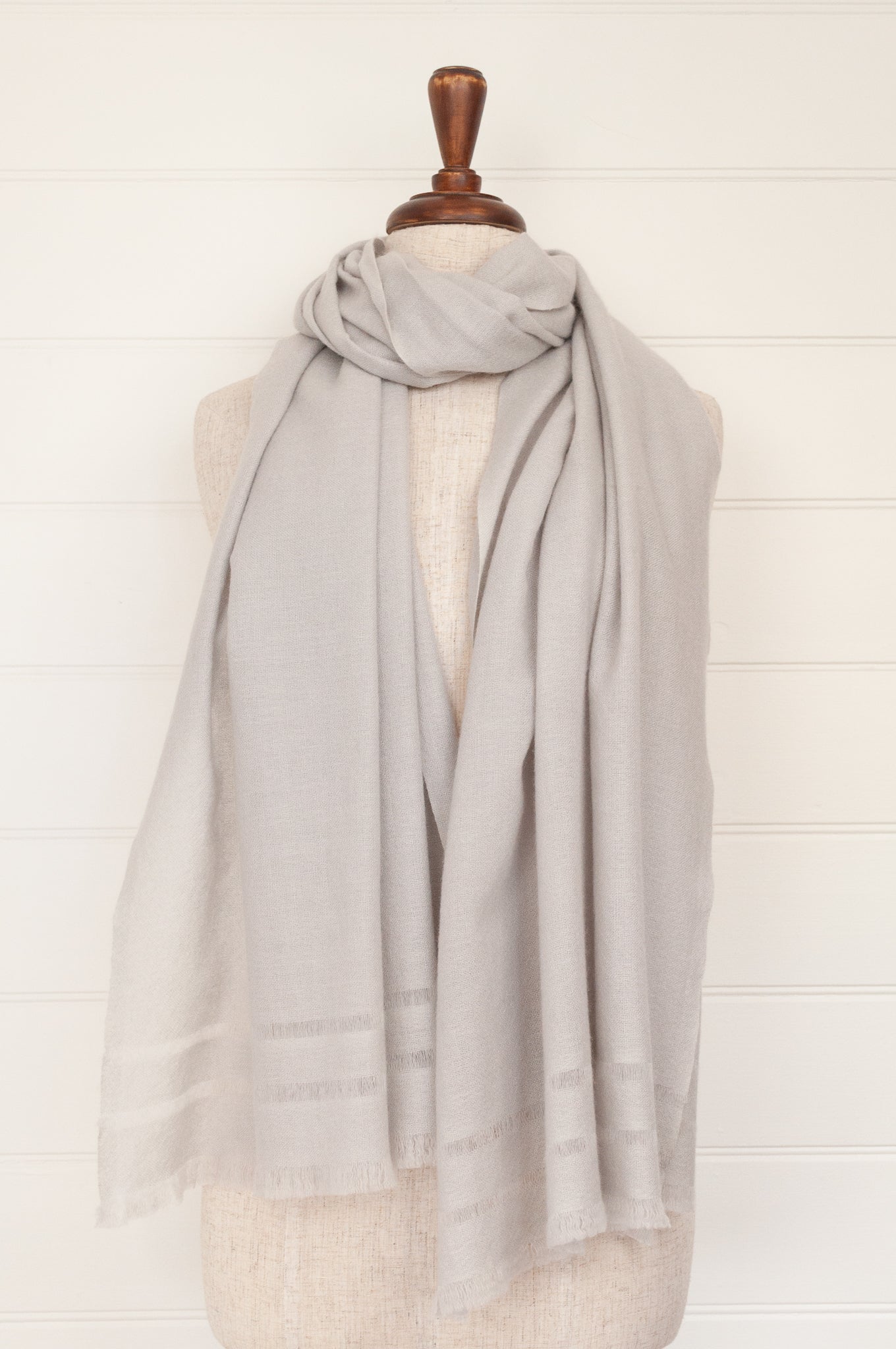 Juniper Hearth woven cashmere scarf featuring fagoting detail and fringed at ends, in silver grey.