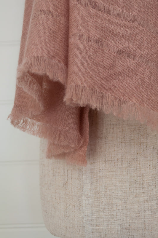 Juniper Hearth woven cashmere scarf featuring fagoting detail and fringed at ends, in vintage rose pink.
