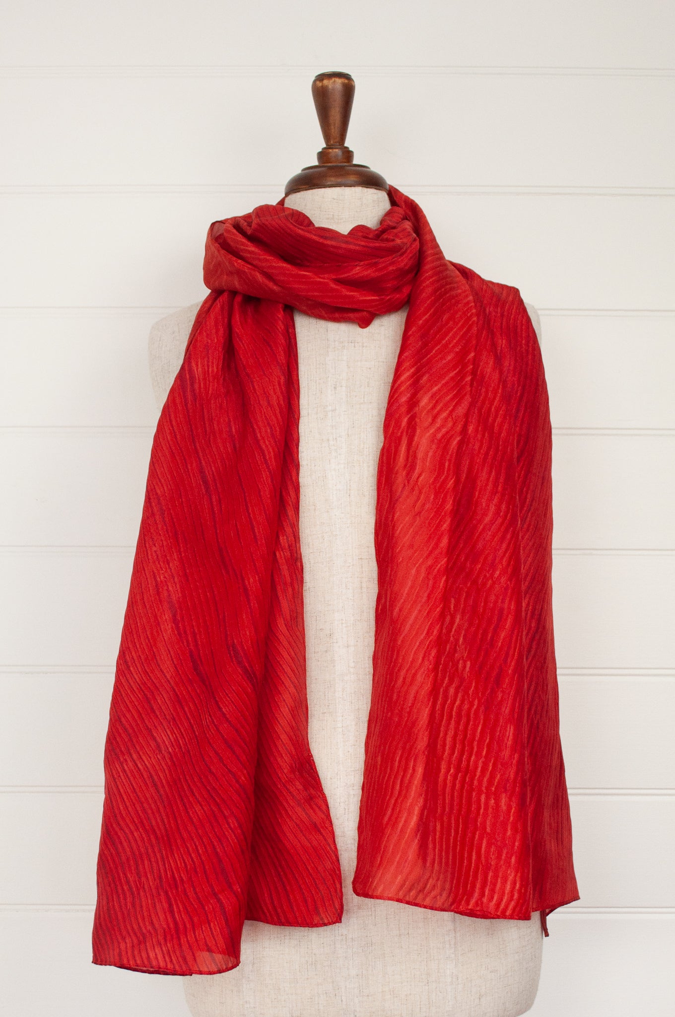 Neeru Kumar silk shibori scarf in scarlet with highlights of deep rose pink.