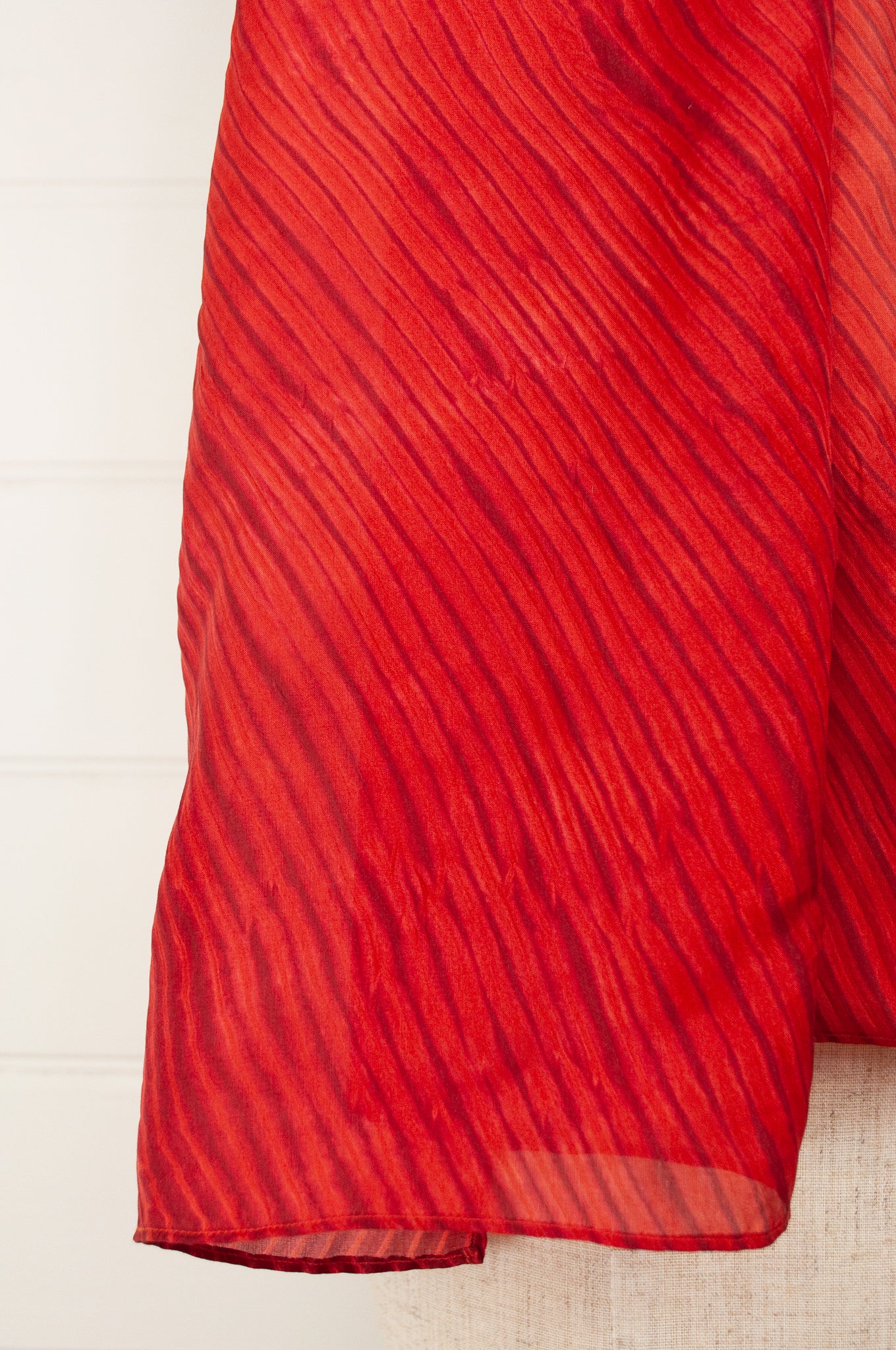 Neeru Kumar silk shibori scarf in scarlet with highlights of deep rose pink.