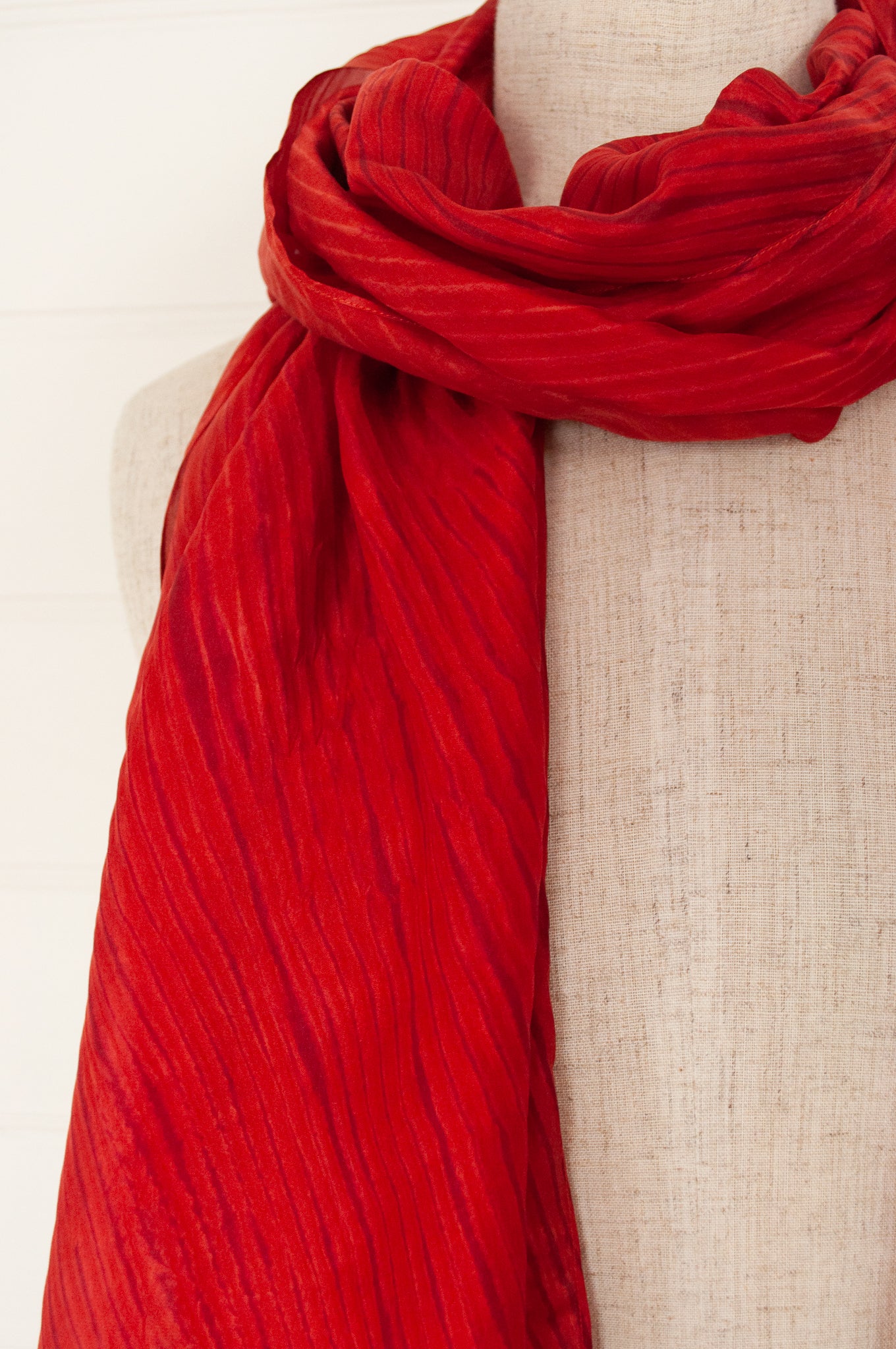 Neeru Kumar silk shibori scarf in scarlet with highlights of deep rose pink.