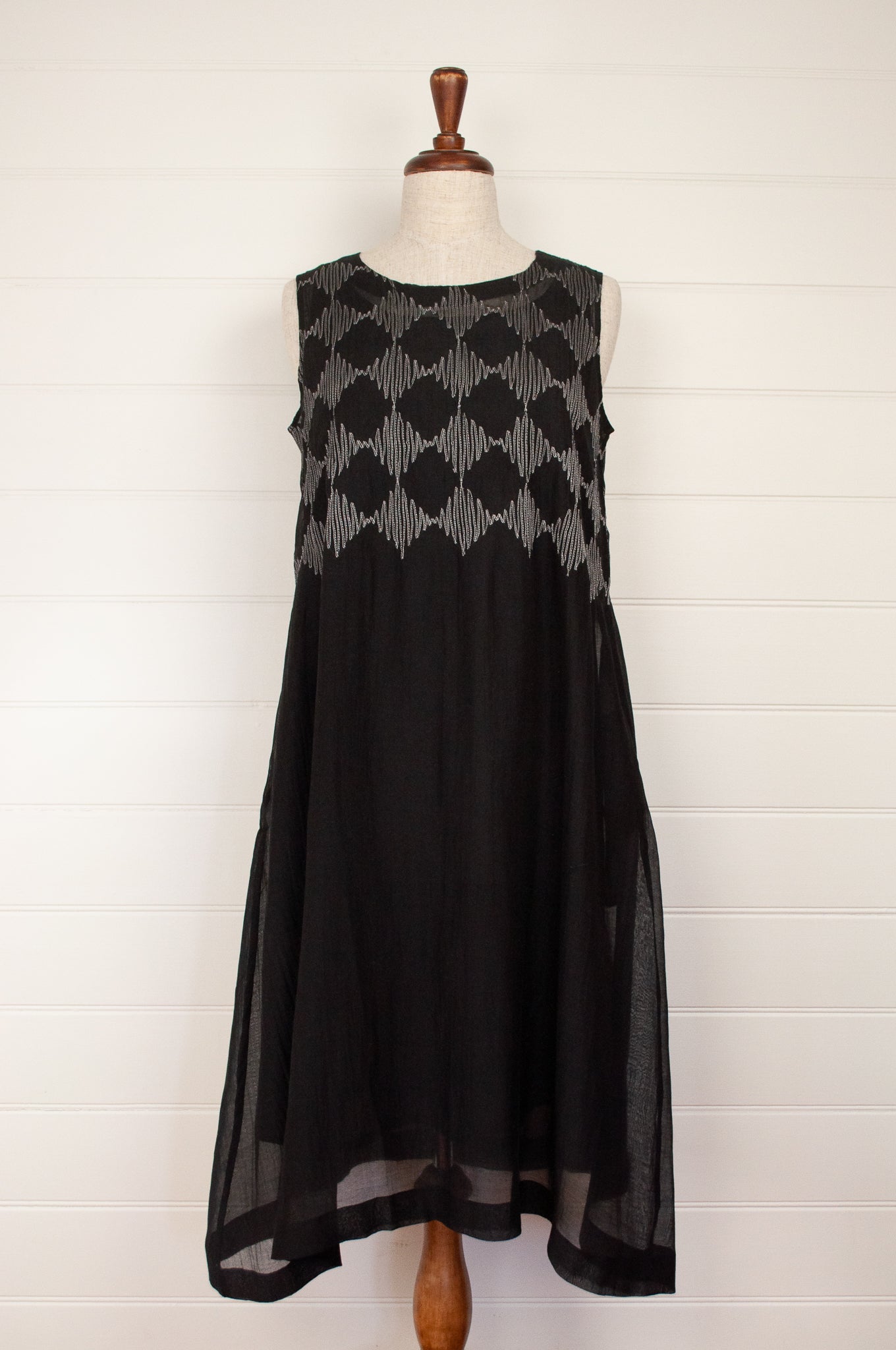 Neeru Kumar Pedro dress - embroidered cotton silk, white on black. A line sleeveless dress includes slip.