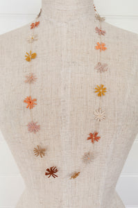 Sophie Digard crocheted linen necklace in the warm neutral Noon palette.