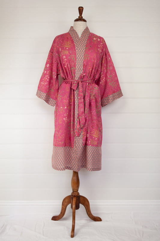 Ethically made, cotton voile kimono robe dressing gown in deep raspberry pink floral print.
