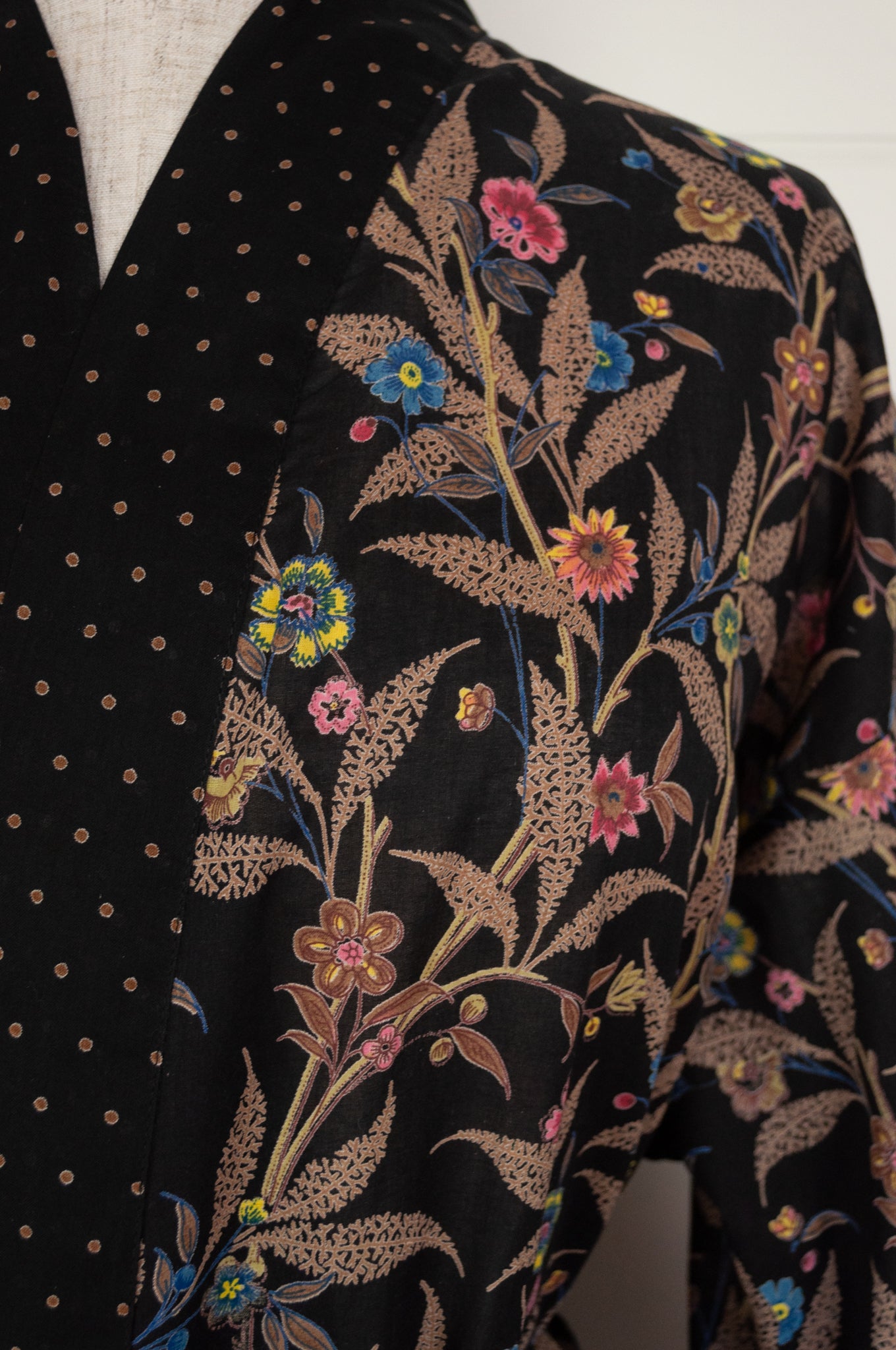 Ethically made, cotton voile kimono robe dressing gown in floral print on black.