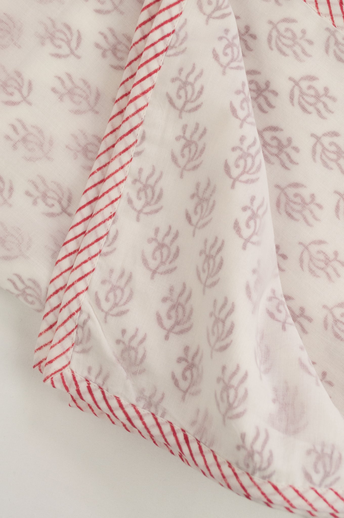 Baby dohar lightweight three layered baby wrap cot quilt, cotton muslin block printed, raspberry red sprig pattern.