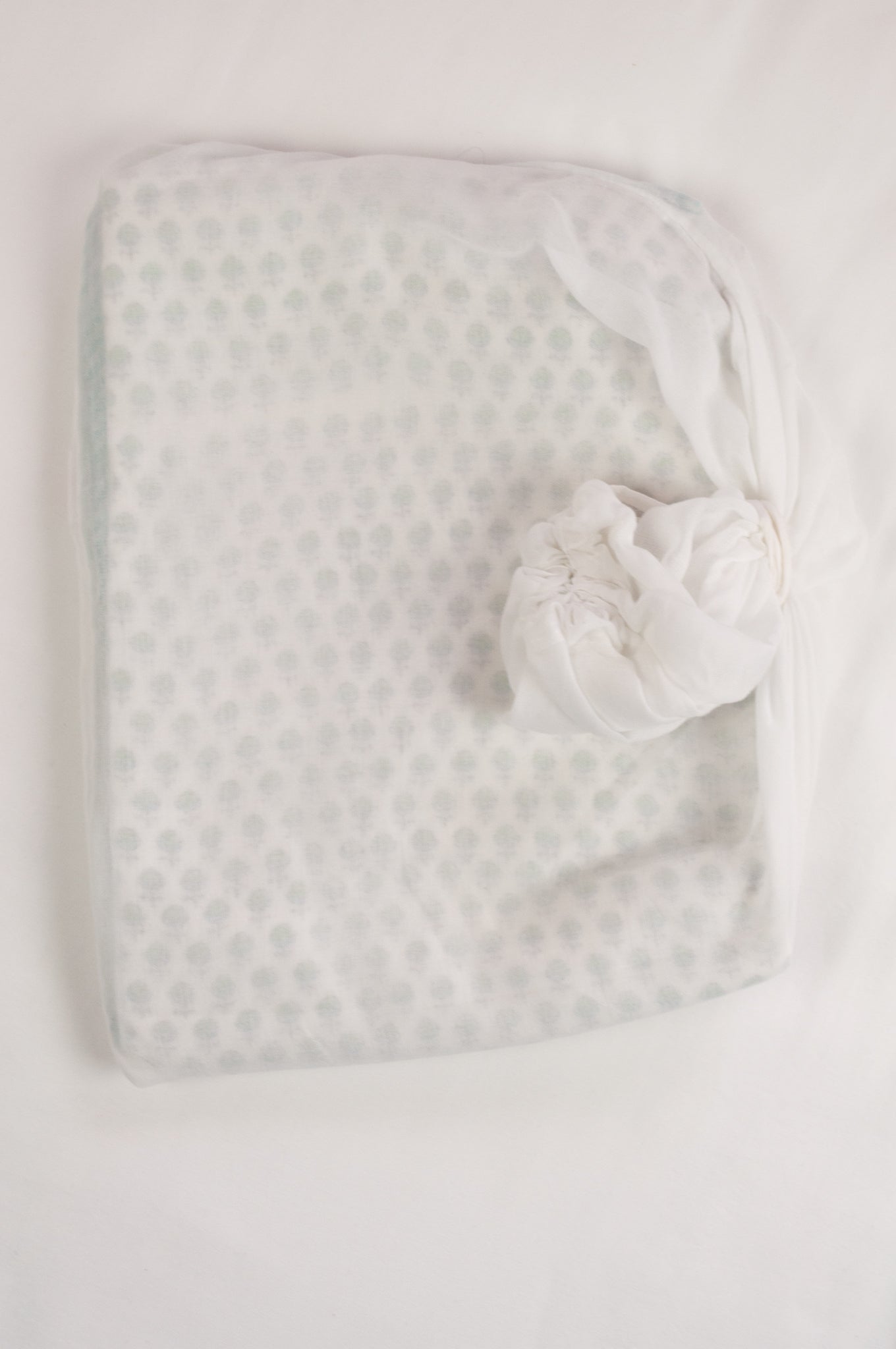 Baby dohar lightweight three layered baby wrap cot quilt, cotton muslin block printed, aqua and green sprig pattern.
