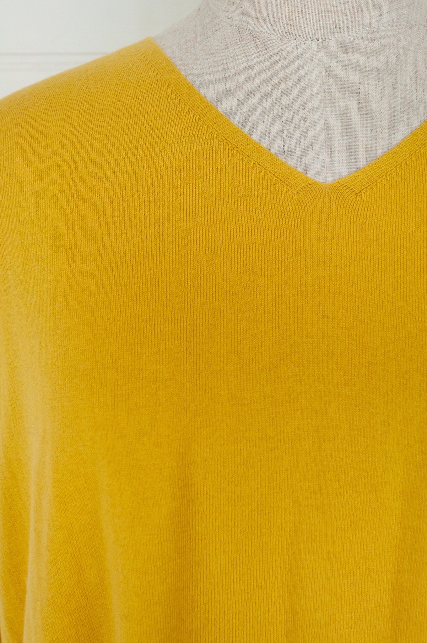 One size V-neck slouchy cashmere cotton summer sweater in buttercup yellow.