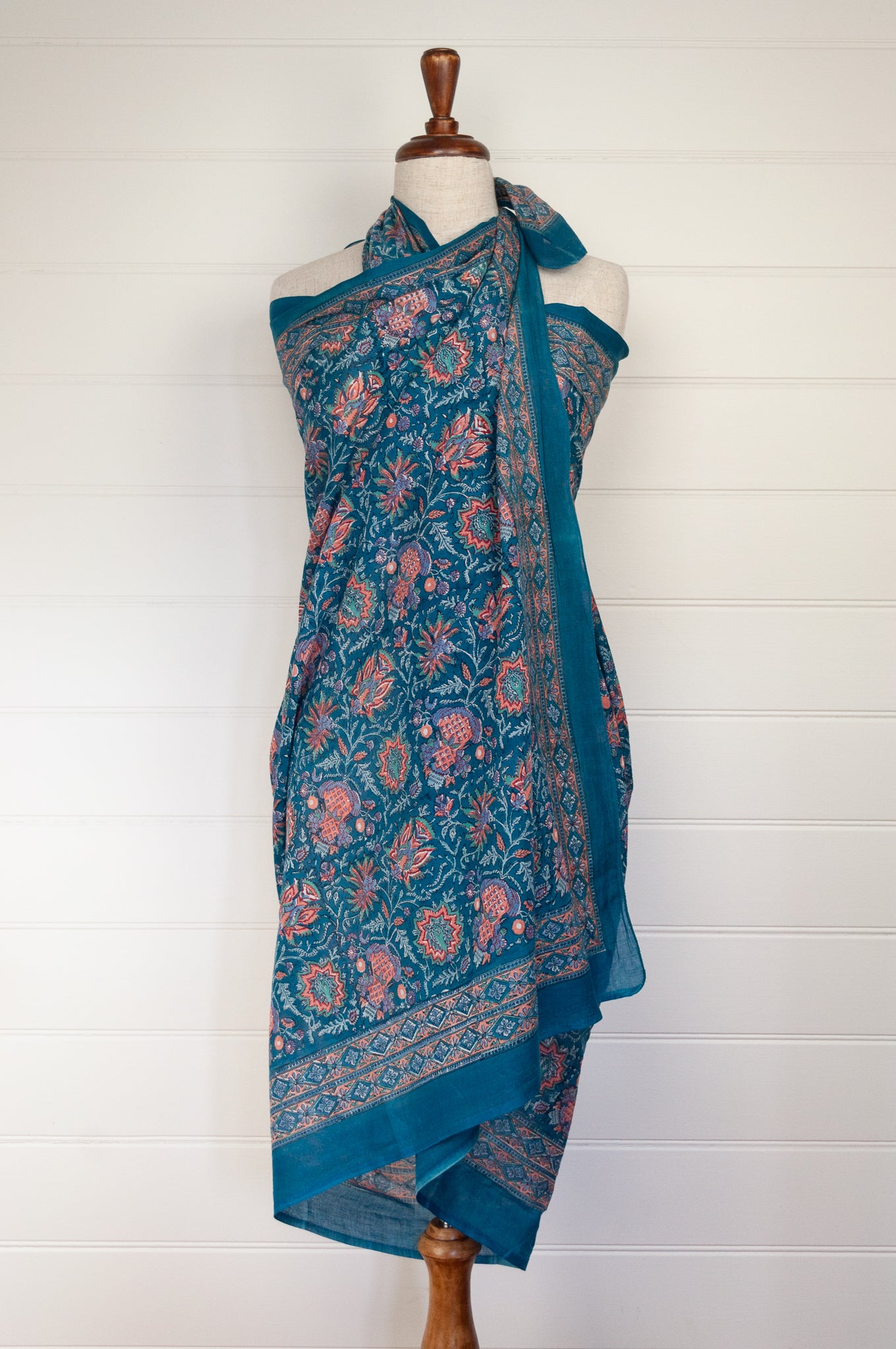 JH cotton voile sarong wrap scarf in teal floral with highlights in coral.
