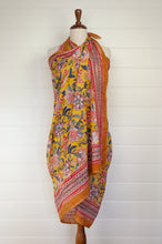 Load image into Gallery viewer, Cotton voile blockprint sarong, colourful floral on mustard yellow.