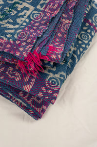 Vintage kantha quilt upcycled from cottonn saris, handstitched and overdyed with mud resist in natural indigo, and brilliant pink border stitching.