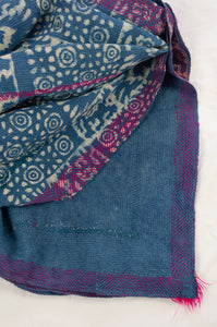 Vintage kantha quilt upcycled from cottonn saris, handstitched and overdyed with mud resist in natural indigo, and brilliant pink border stitching.