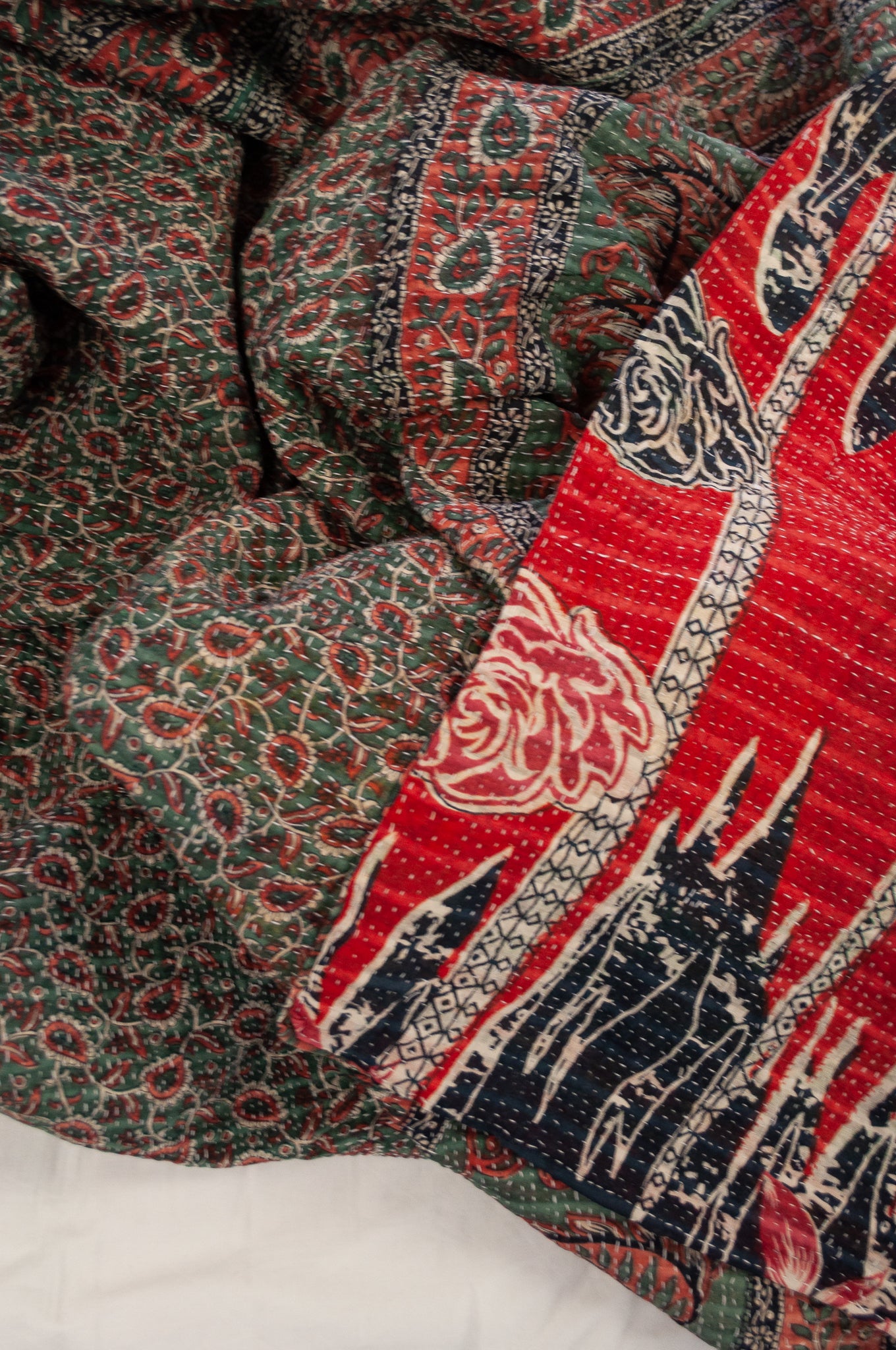 Vintage kantha quilt upcycled from cottonn saris, handstitched, in dramatic red white and blue floral with co-ordinating paisley in red white and soft green.