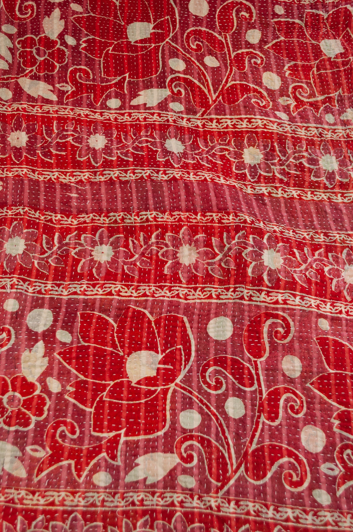 Vintage kantha quilt upcycled from cottonn saris, handstitched, in dramatic red white and blue floral with co-ordinating paisley in red white and soft green.