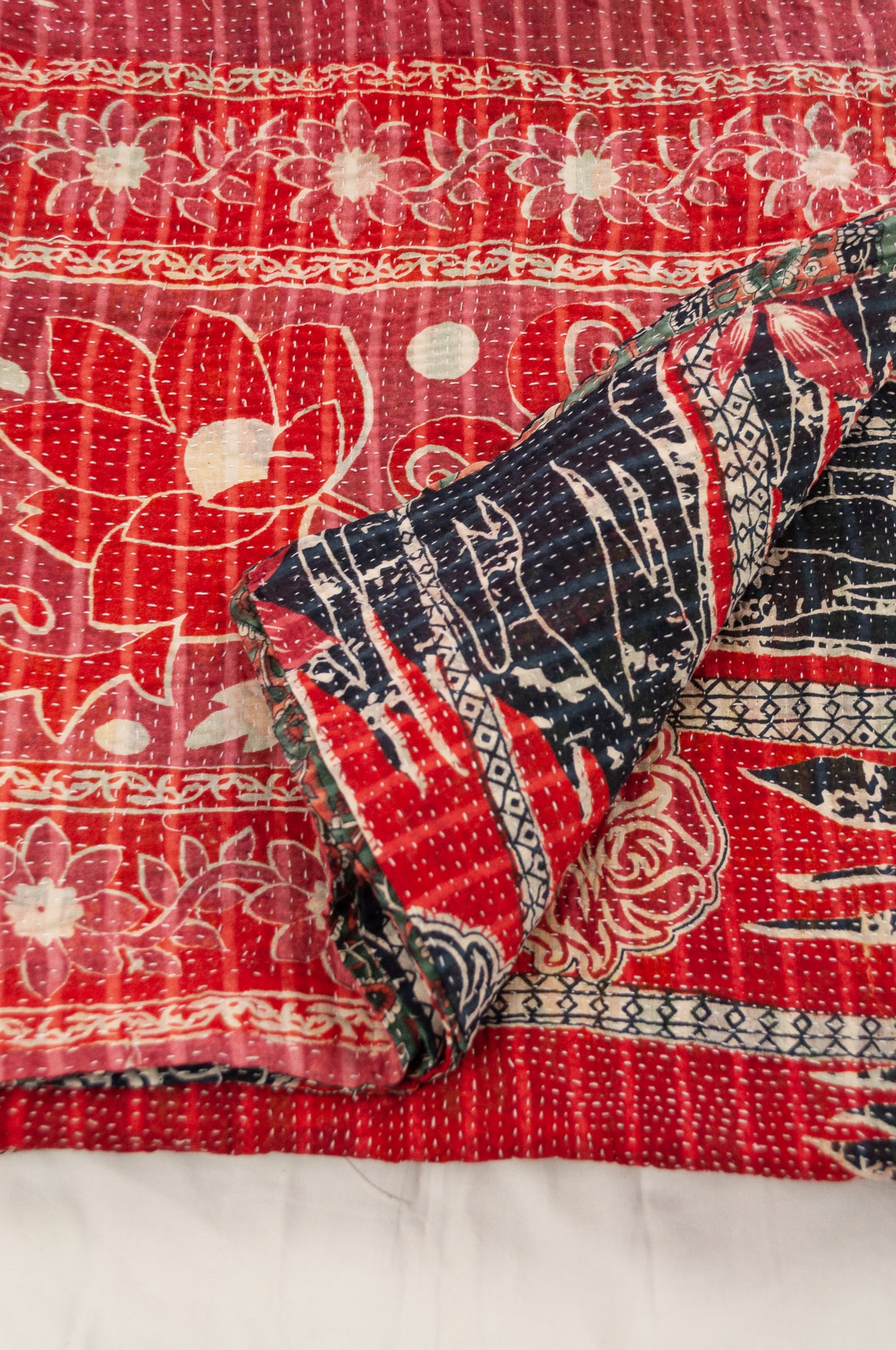 Vintage kantha quilt upcycled from cottonn saris, handstitched, in dramatic red white and blue floral with co-ordinating paisley in red white and soft green.