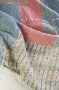 Washed vintage kantha quilt, soft pastel stripes and checks.