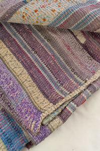 Striped and patched multi coloured vintage kantha quilt, heavy weight finely stitched.
