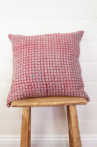 Vintage kantha quilt blockprinted square cushion in red and white checks.