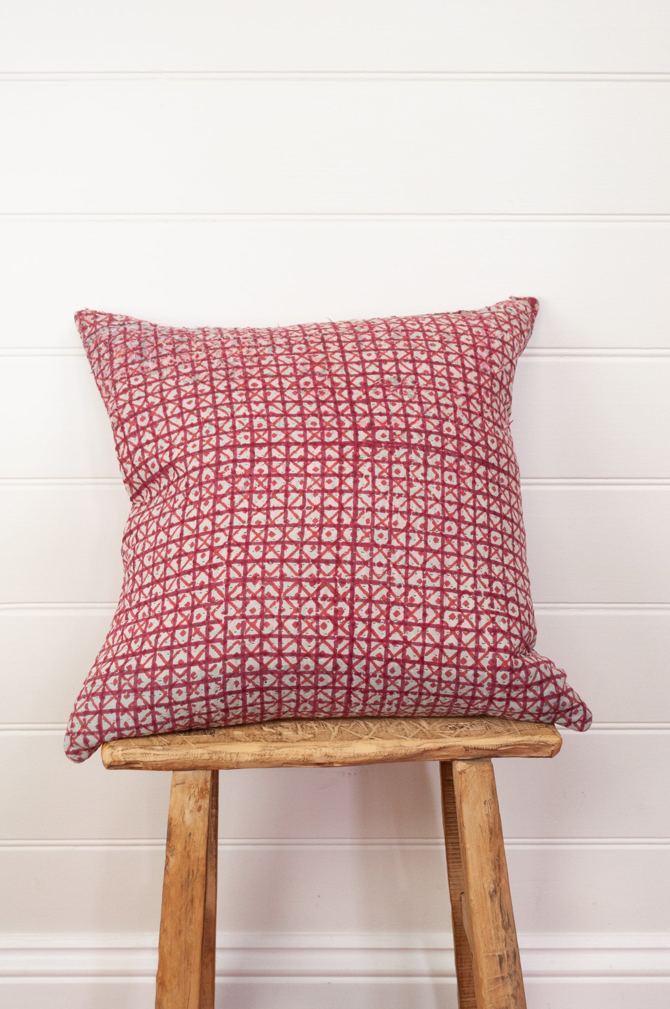 Vintage kantha quilt blockprinted square cushion in red and white checks.