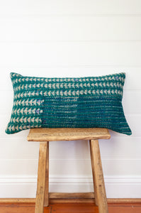 Vintage kantha oblong rectangular bolster cushion blockprinted with arrow and stripe design in deep blue green.