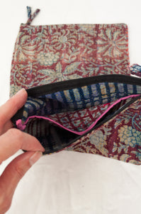 Zippered cotton pouches made from vintage kantha quilt remnants in burgundy red floral blockprinted design.