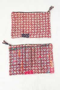 Zippered cotton pouches made from vintage kantha quilt remnants in red and white check blockprinted design.