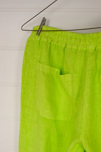 Haris Cotton lime green cropped linen pants with elastic waist, side pockets and rear patch pockets.