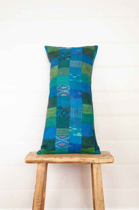 Vintage silk patchwork vibrant shades of aquamarine, turquoise, blue, emerald green and lime green, with a touch of ikat.
