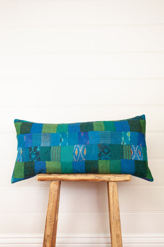 Vintage silk patchwork vibrant shades of aquamarine, turquoise, blue, emerald green and lime green, with a touch of ikat.