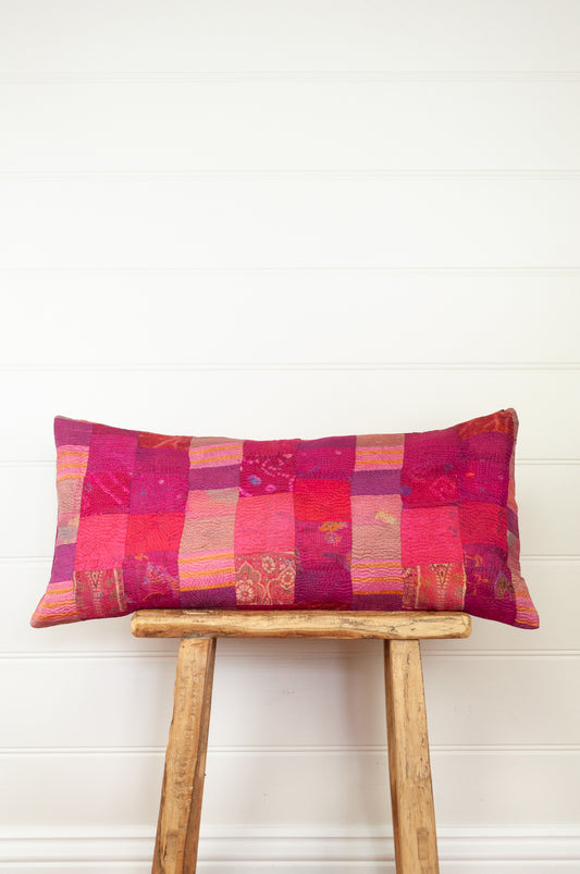 Vintage silk patchwork shades of ruby red and magenta pink and rose.