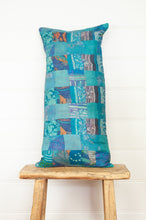 Load image into Gallery viewer, Vintage silk patchwork vibrant shades of cerulean blue with dashes of orange.