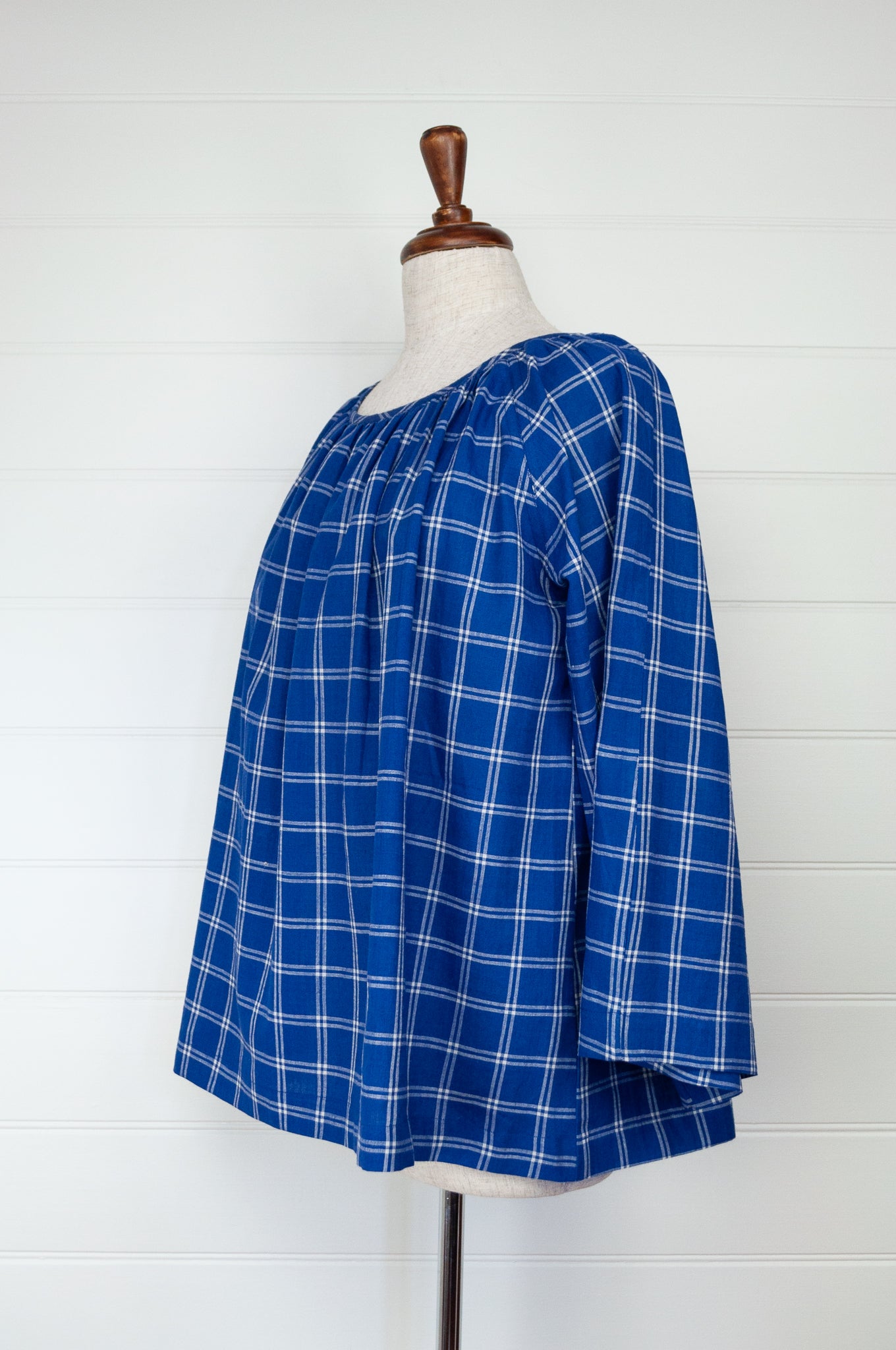 Juniper Hearth Yuka top, Japanese style smock top in handloom handwoven windowpane check blue and white cotton, gathered neck, long sleeve, loose fitting one size smock.