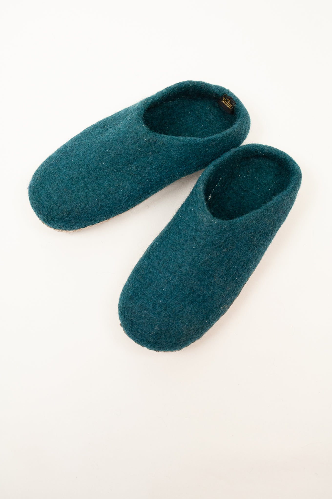 Teal turquoise wool felt slippers, slip on style, fair trade and ethically made in Nepal.