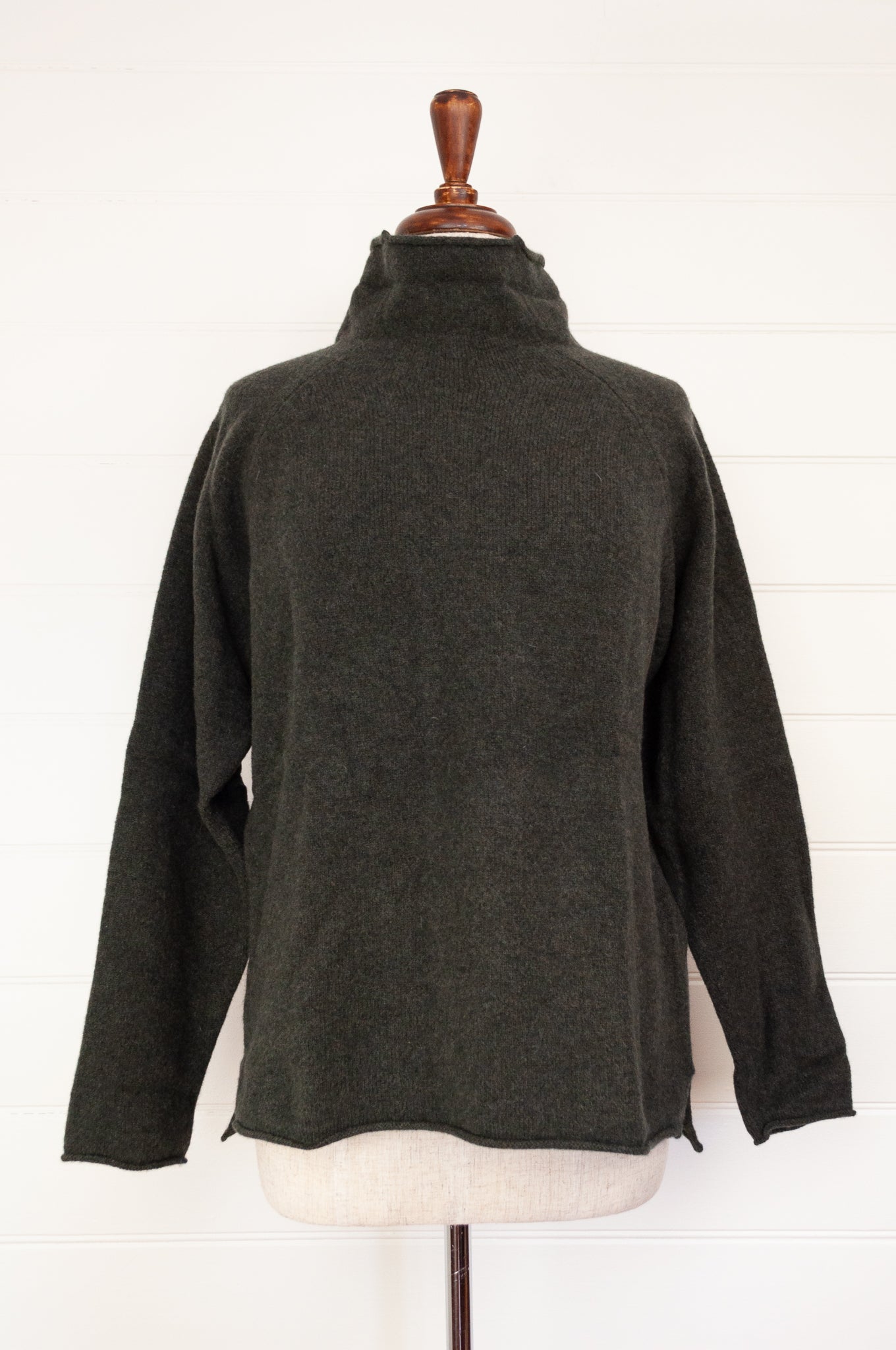 Eribe made in Scotland pure lambswool merino wool Corry raglan sweater, relaxed fit, roll neck, in Seaweed, deep olive green.
