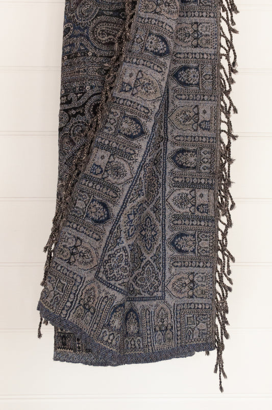 Juniper Hearth pure wool tasseled reversible throw in denim blue, indigo and charcoal grey paisley.