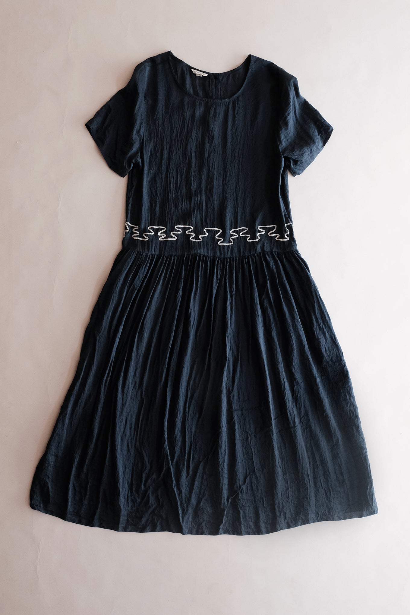 Runaway Bicycle handloom silk Lucy dress with applique waist detail. In charcoal.