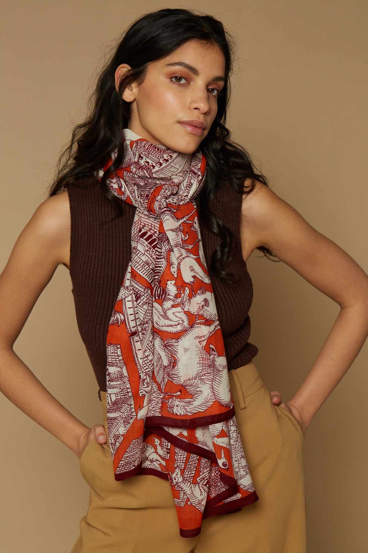 Inoui Editions pure wool scarf Turgot map of Paris with animals surrounding on orange background.
