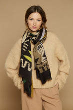 Load image into Gallery viewer, Inoui Editions wool scarf Folk zebra and leopard on a dark brown background with yellow, tan and green flowers.