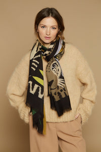 Inoui Editions wool scarf Folk zebra and leopard on a dark brown background with yellow, tan and green flowers.