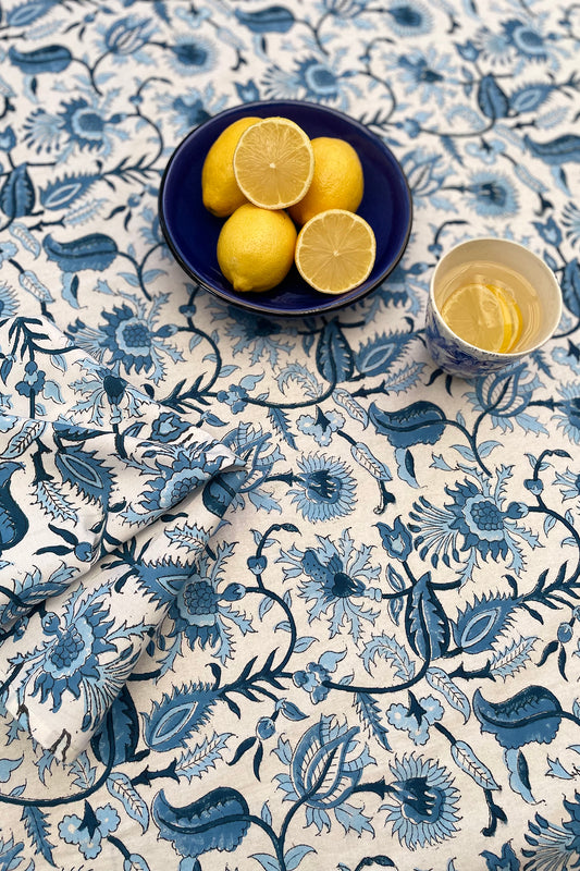 Ethically made artisan block print pure cotton napkin set, shades of blue on white floral design.