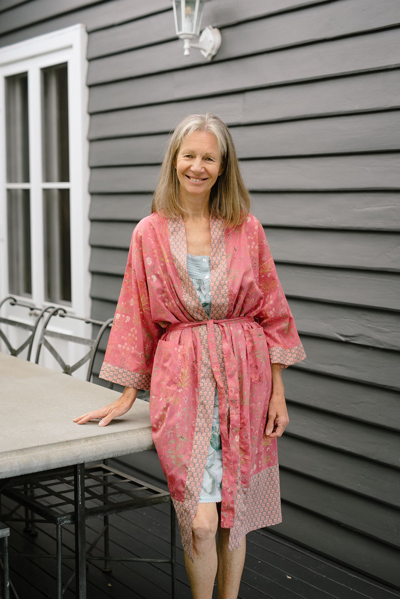 Ethically made, cotton voile kimono robe dressing gown in deep raspberry pink floral print.