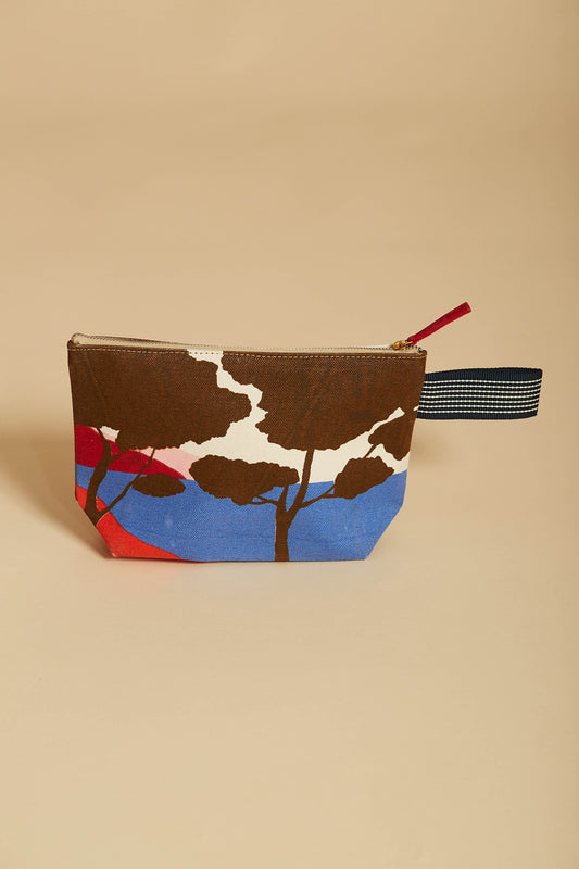 Inoui Editions designed in France Azure cosmetics bag, featuring abstract landscape in azure, red and rust.